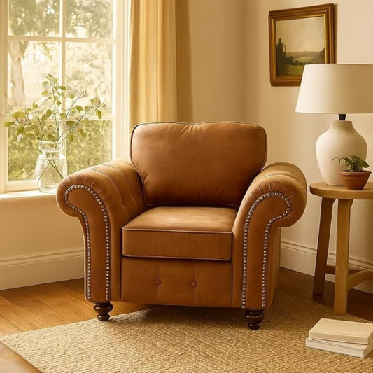 Brown armchair in a cozy living room with a lamp and window.