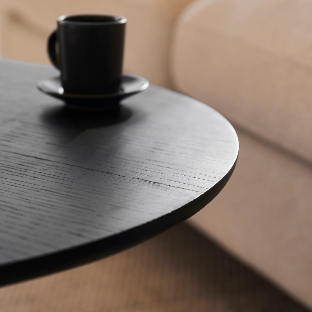 Ciera Oval Wood Coffee Table-Black, close up to table top.