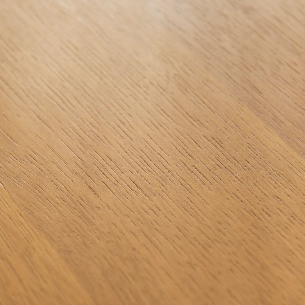 Ciera Oval Wood Coffee Table-Light Oak, close up to table top wood finish.