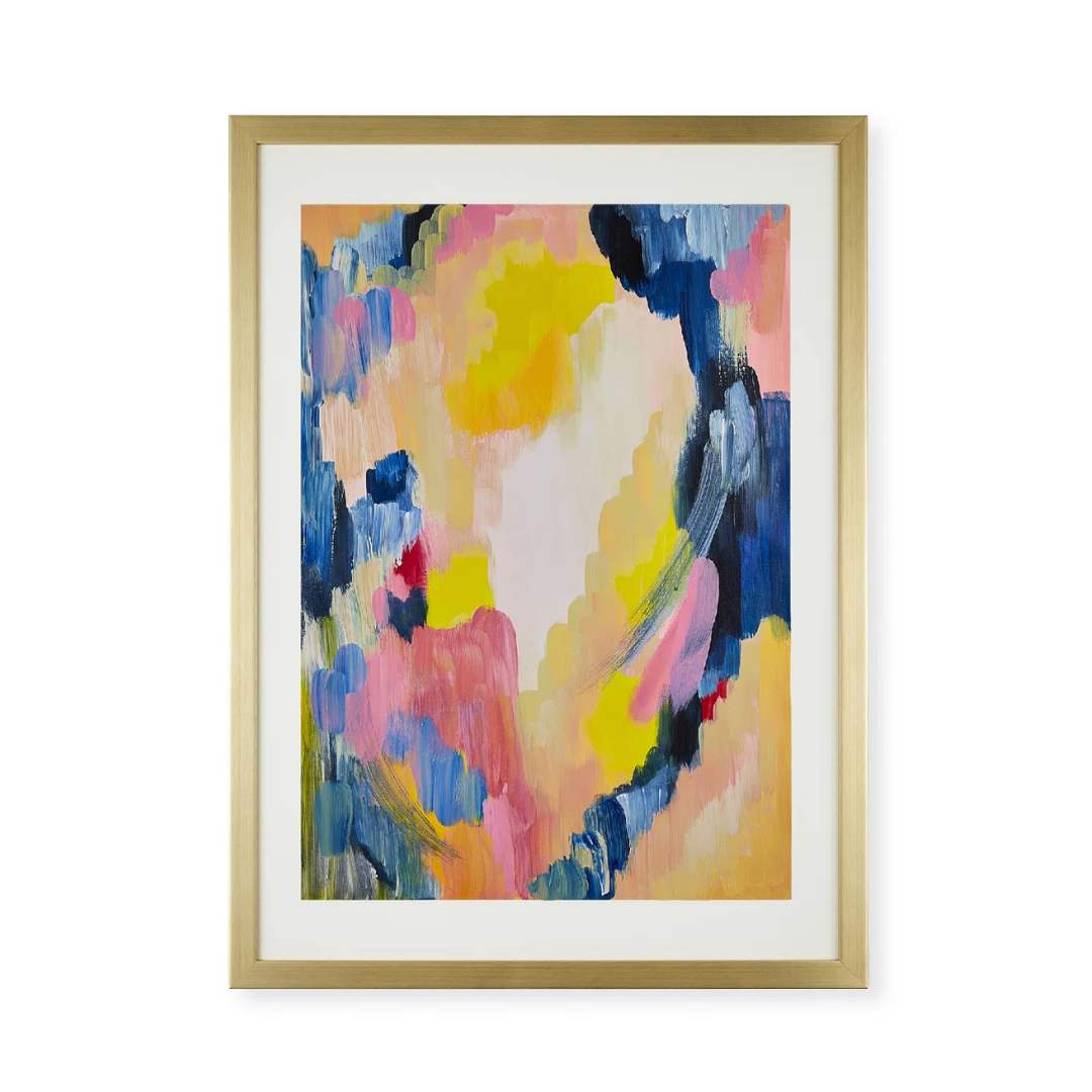 Framed abstract art with colorful brush strokes on a white background