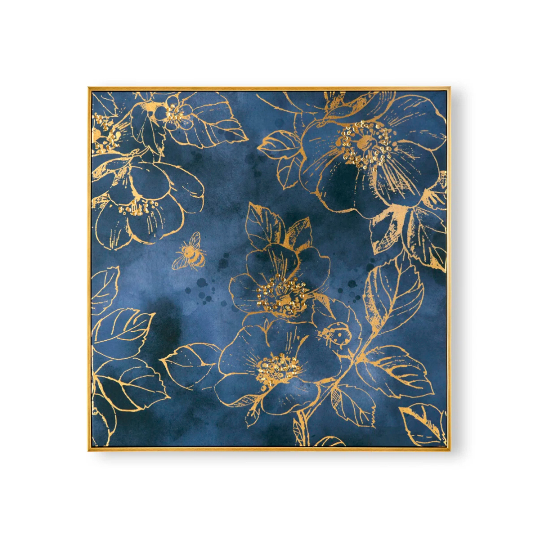 Framed artwork with gold floral design on a blue background