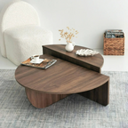 Contemporary low round coffee table with magazine slot, brown table set in a modern home, top view.