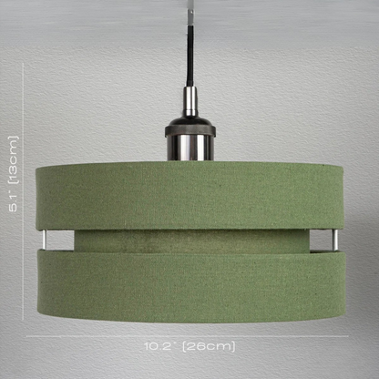 Green pendant light with measurement details on a gray background