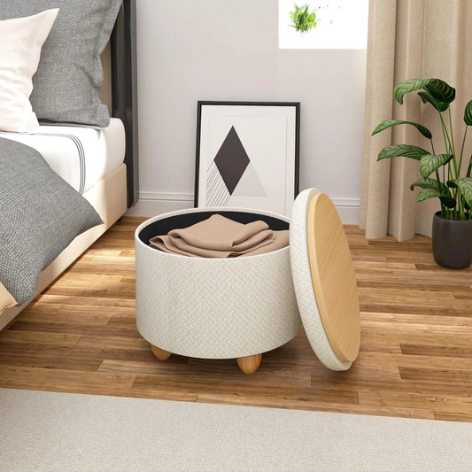 Contemporary Round Ottomans With Storage, cream set in a model bedroom.