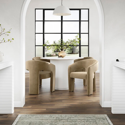 Contemporary Round Stone Dining Room Table, in a modern home.