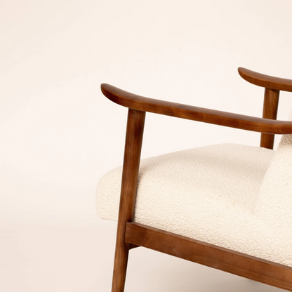 Dark Wood Boucle Modern Mid Century Armchair close up of the dark wood frame
