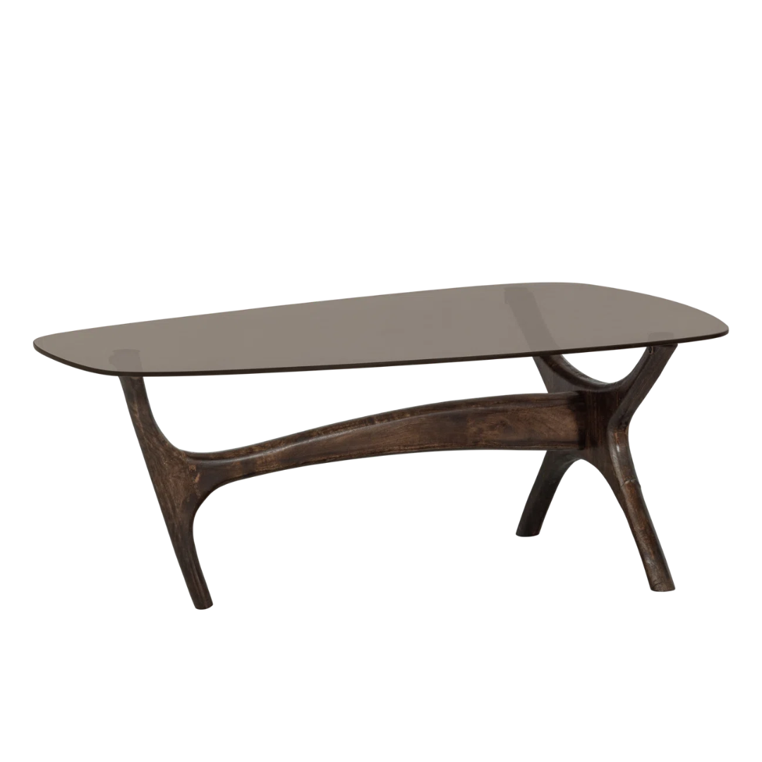 Modern coffee table with glass top and wooden legs on a white background