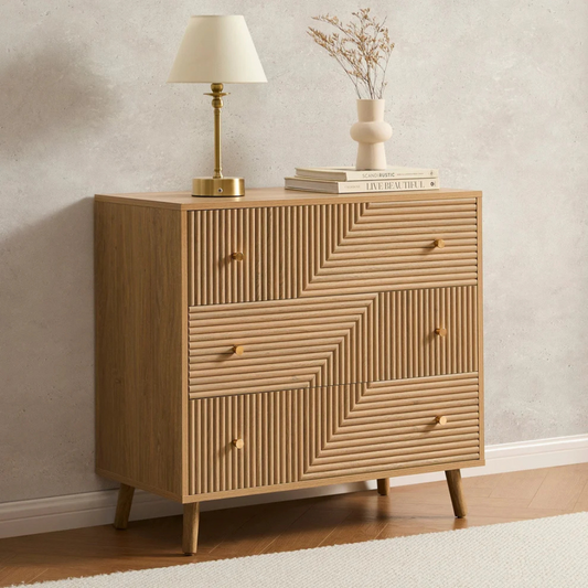 Geometric Mid Century Modern Drawers Chest, Wooden dresser with geometric design, lamp, and books against a neutral wall.