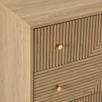 Geometric Mid Century Modern Drawers Chest, Wooden cabinet with geometric pattern and gold knobs, close up to design.