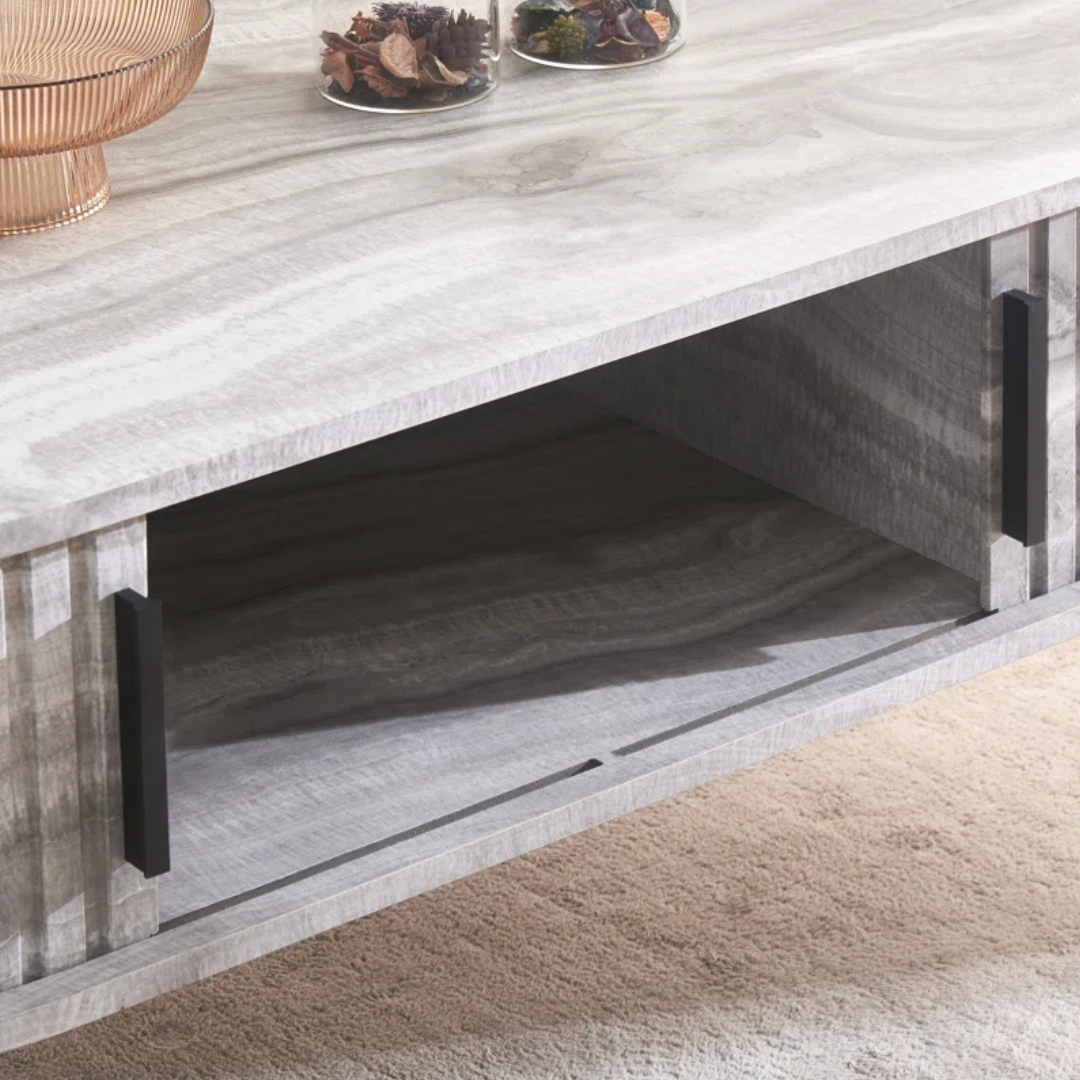 Grey marble effect oval coffee table, close up to the doors open.