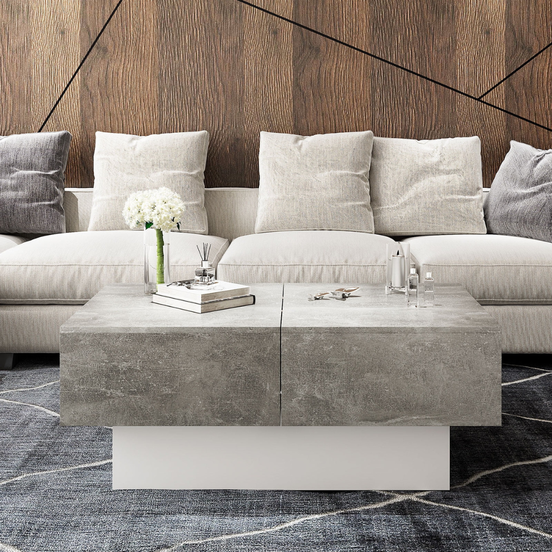 Grey modern coffee table with hidden storage drawers, drawers closed.