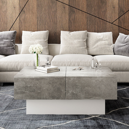 Grey modern coffee table with hidden storage drawers, drawers closed.
