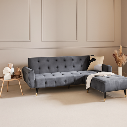 Grey Retro Style Sofa Bed With Ottoman, set in a modern home, ottoman attached.