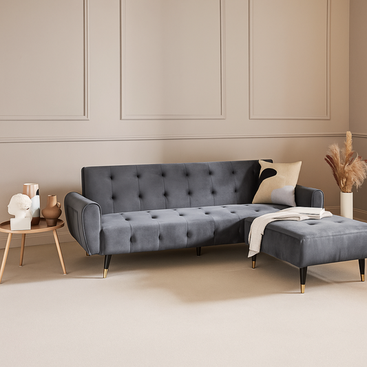 Grey Retro Style Sofa Bed With Ottoman, set in a modern home, ottoman attached.