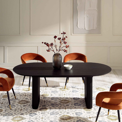 Japandi Black Oval Extending Dining Table, extended in a modern dining room, front view.
