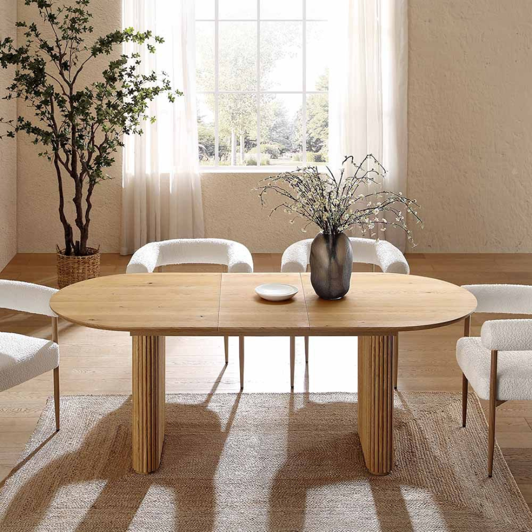Japandi Wooden Oval Extending Dining Table, set in a modern home, side view.