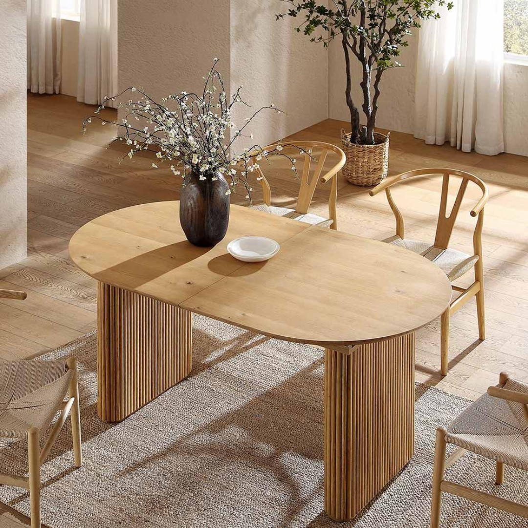 Japandi Wooden Oval Extending Dining Table, set in a modern dining room with 4 wishbone dining chairs.