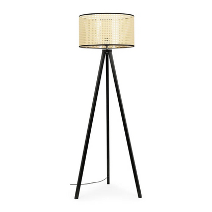 Black tripod floor lamp with a woven shade on a white background