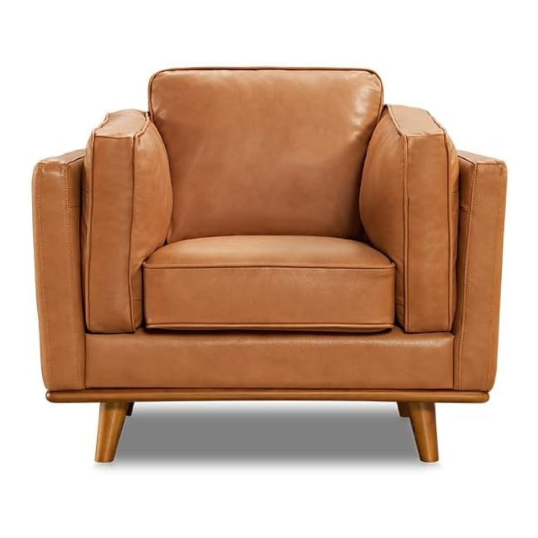 Brown leather armchair on a white background
