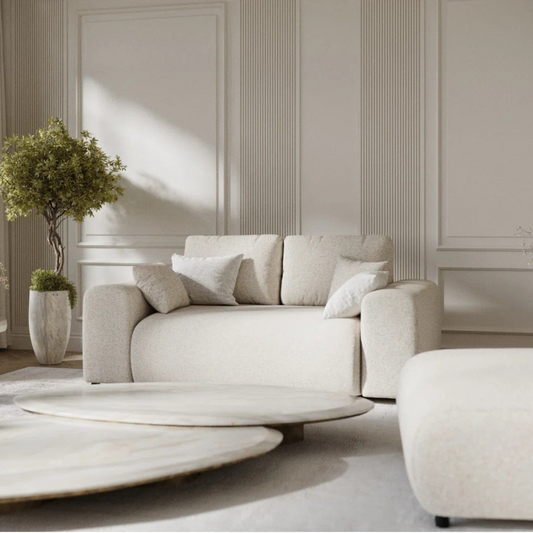 Modern 2-Seater Cream Boucle Sofa, set in a modern home, close up. 
