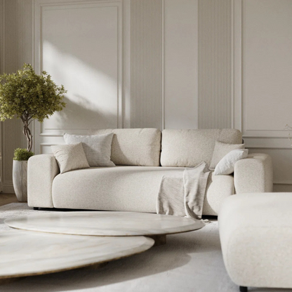 Modern 3-Seater Cream Boucle Sofa, close up in a modern home.