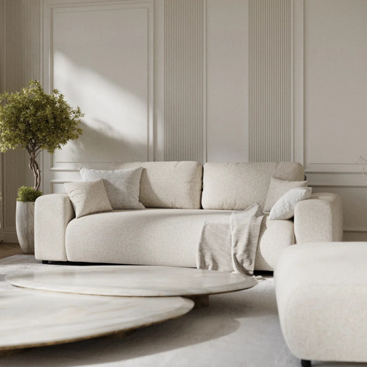 Modern 3-Seater Cream Boucle Sofa, close up in a modern home.