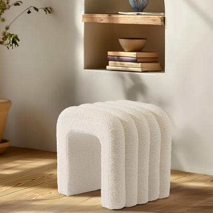 Modern Boucle Ottoman Stool, set in a modern model home.