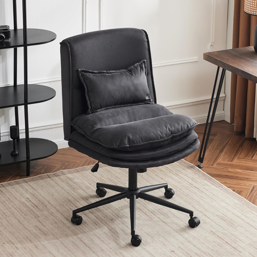 modern ergonomic armless office chair with cushioned seat, black chair in a modern office.