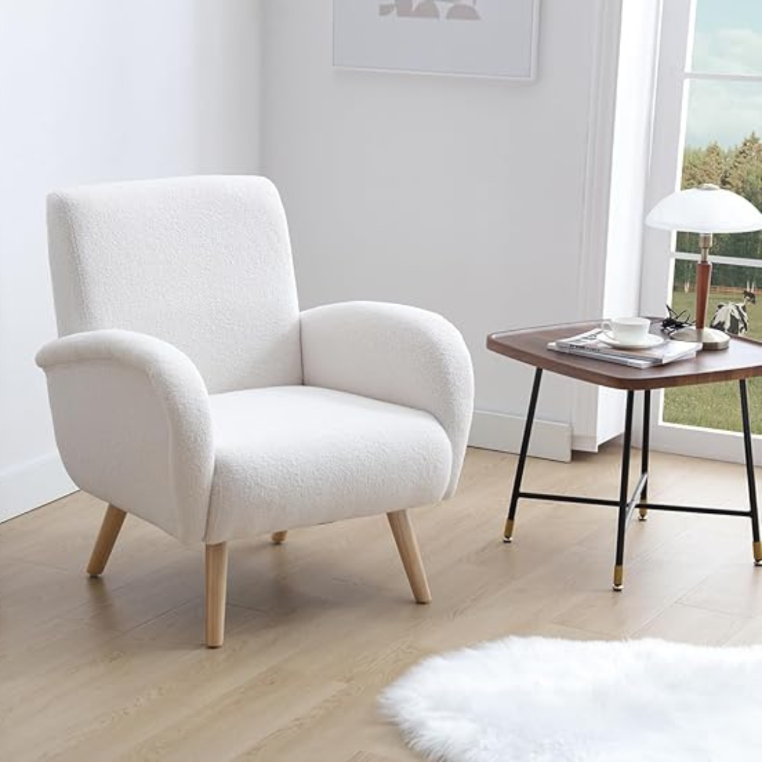 modern faux fur armchair with high back and rounded arms, set in the corner of a modern living room.