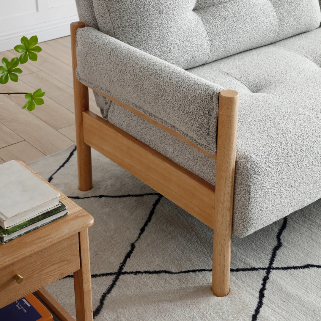 Modern Light Grey Sofa Bed Boucle, close up of boucle and solid wood frame.