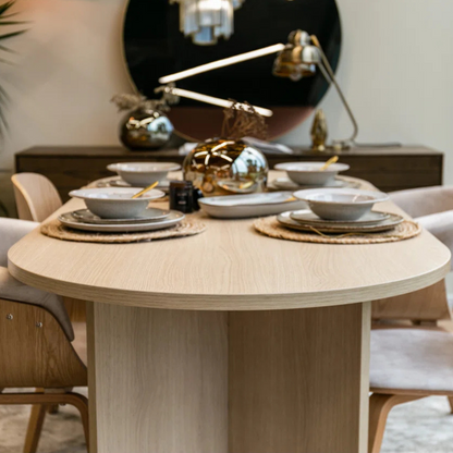 Modern Oval Wooden Dining Table, face view in a modern home.