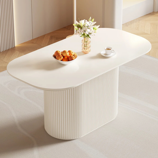 Modern White Oval Dining Room Table, angled view in a modern home.