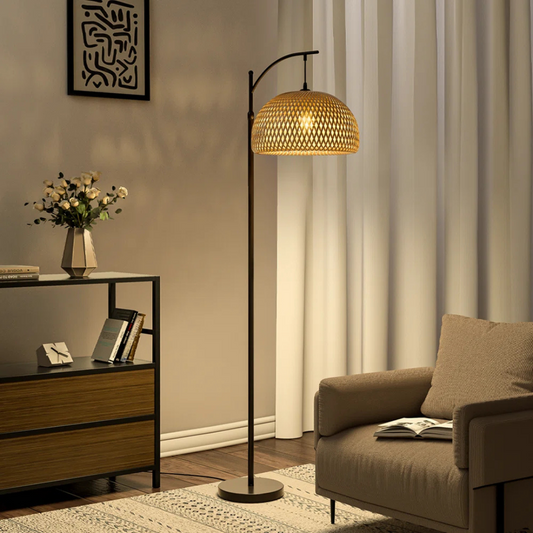 Living room with a floor lamp, sofa, and side table.