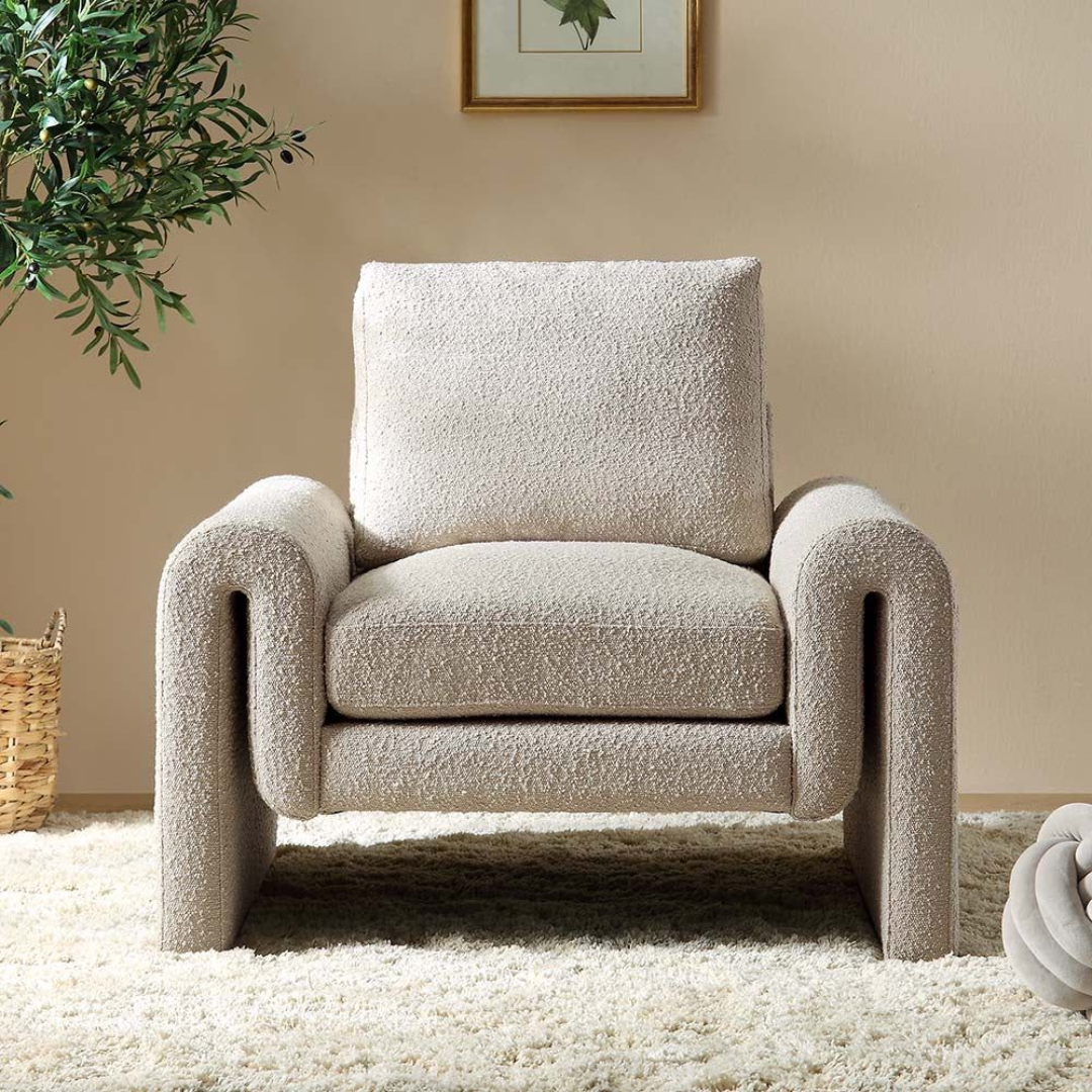 Modern Boucle Accent Chair styled in a cosy living room corner front view