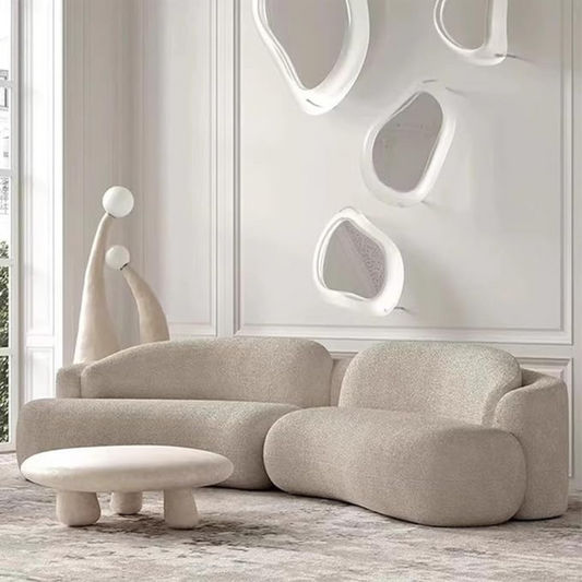 Modern Modular Curved White Boucle Sofa, set in a modern home, front view.