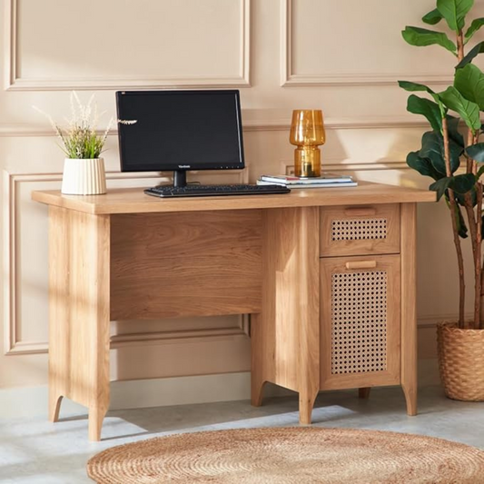 Wooden desk with computer setup in a home office setting