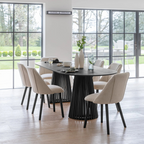 Modern Scandinavian Dining Table Black, set in a modern home with 6 dining chairs.