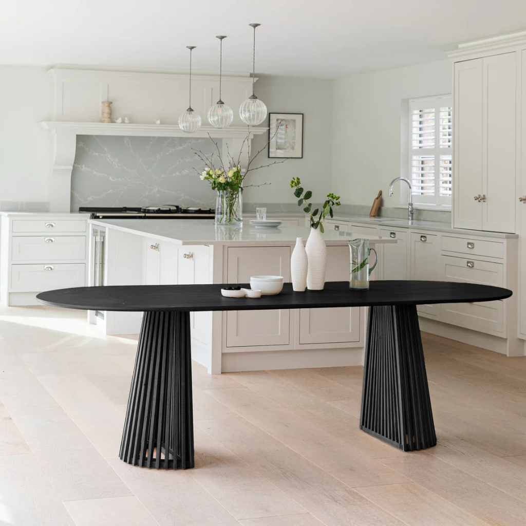 Modern Scandinavian Dining Table Black, side view in a modern dining room.