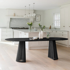Modern Scandinavian Dining Table Black, side view in a modern dining room.