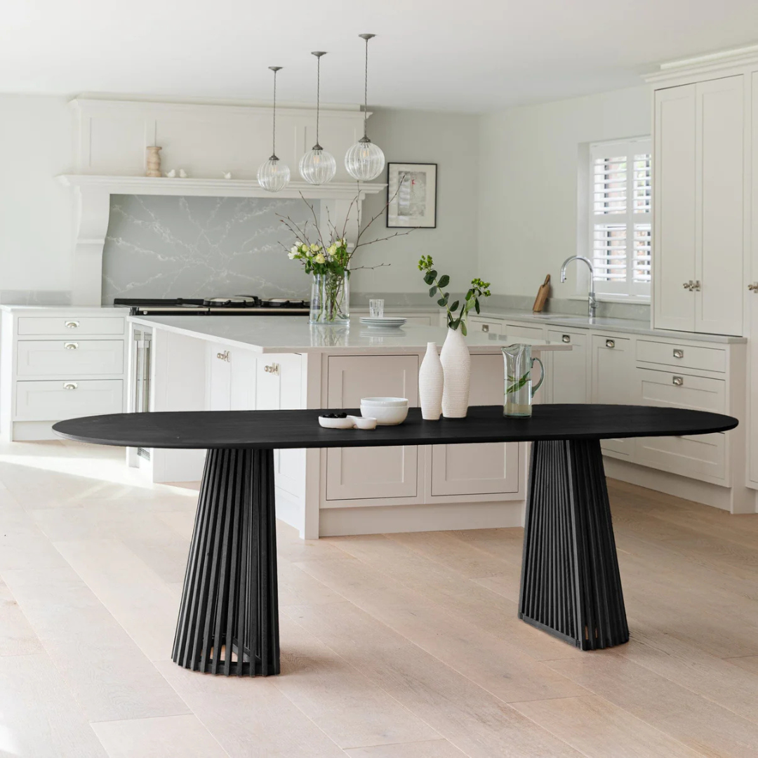 Modern Scandinavian Dining Table Black, side view in a modern dining room.