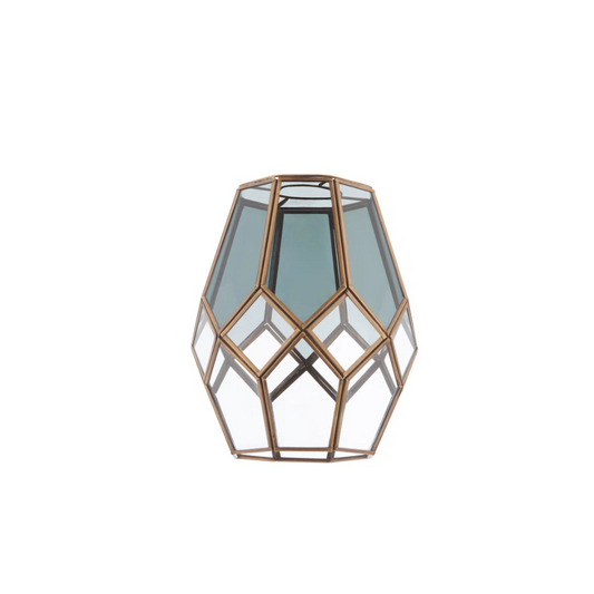 Geometric glass lantern with bronze frame on a white background