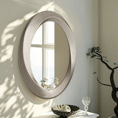 Oval Contemporary Baroque Style Mirror, set in a modern model home.