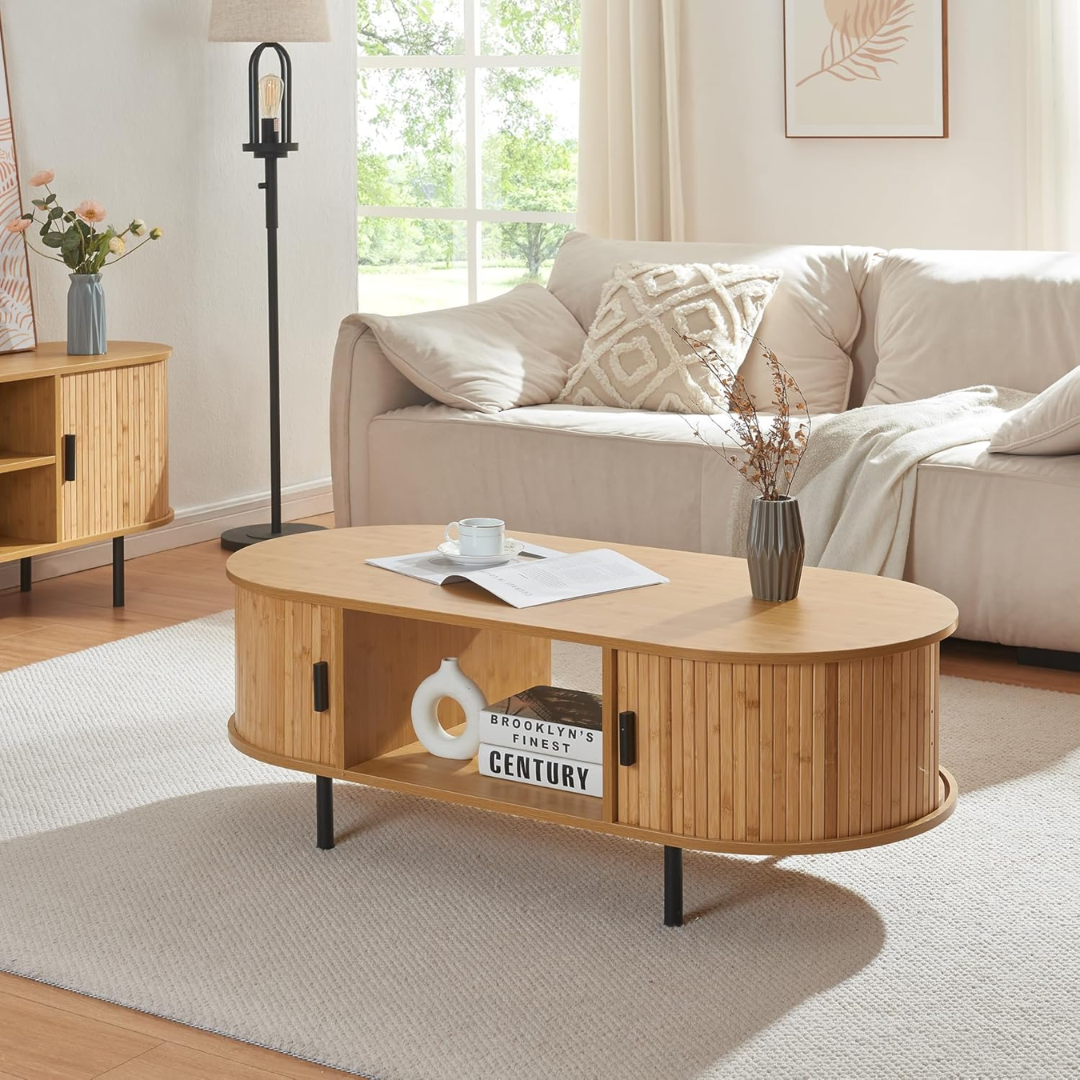 Wooden coffee table in a living room with a sofa and decorative items.