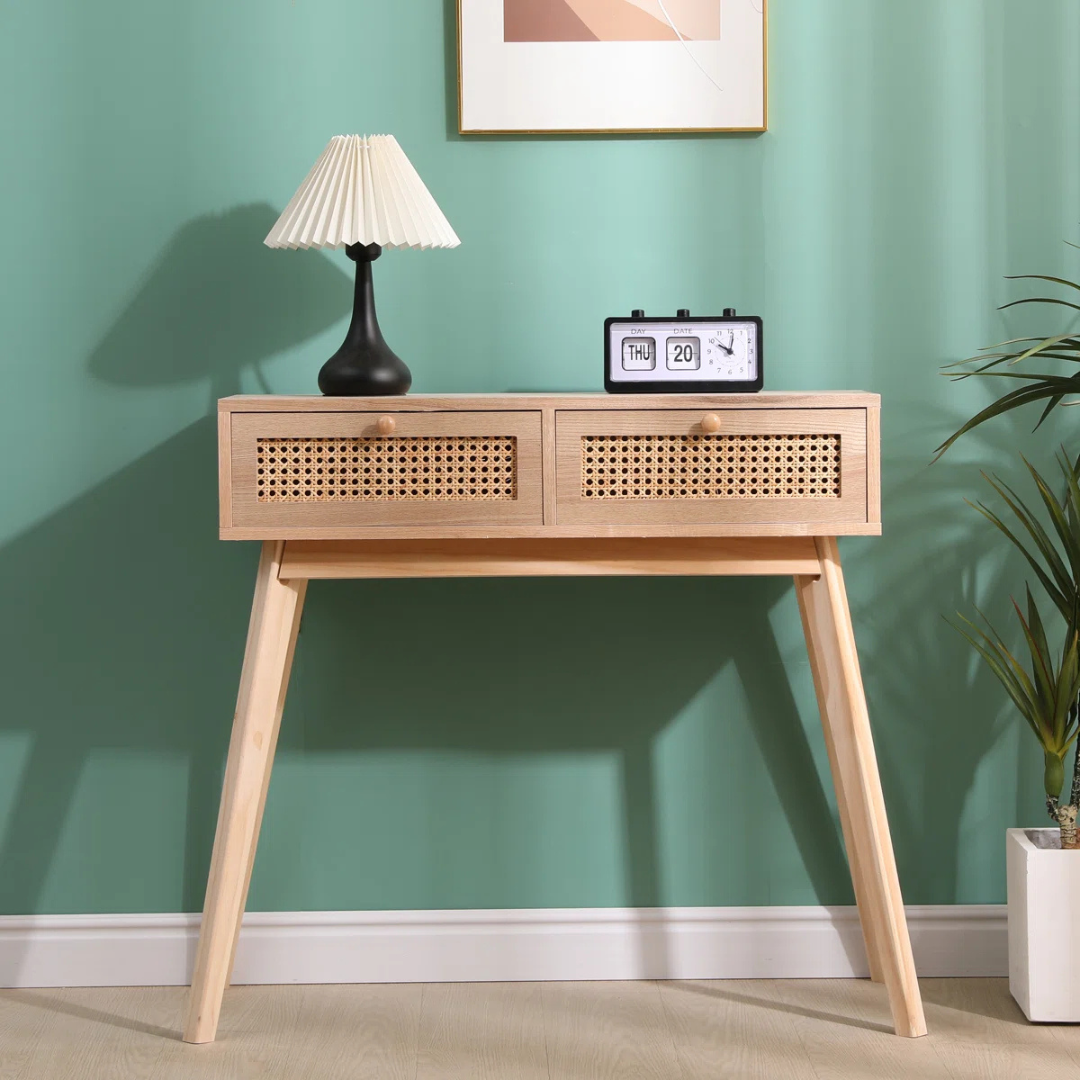 Rattan Hallway Table With Drawers, in a mid century home, front view.