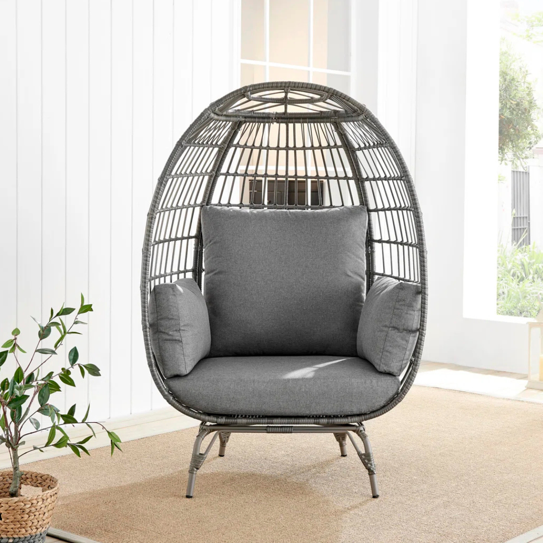 Rattan Standing Egg Chair, in a modern home, front view.