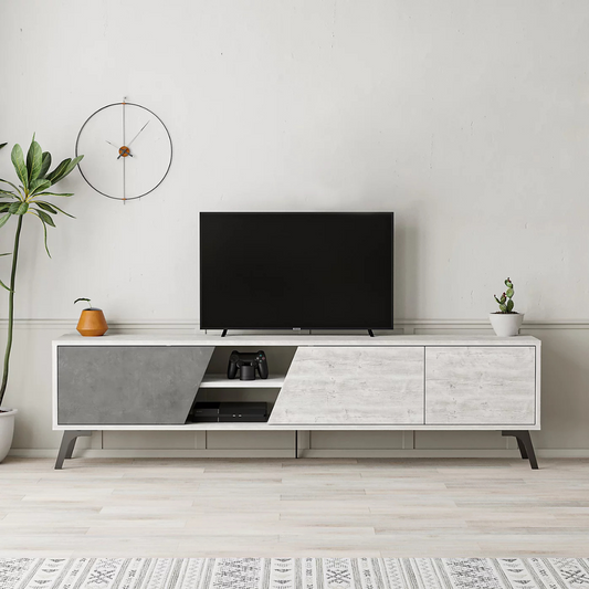Modern TV stand with a television in a minimalistic living room.