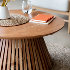 Round Mid Century Modern Coffee Table close up of the slated base and round table top