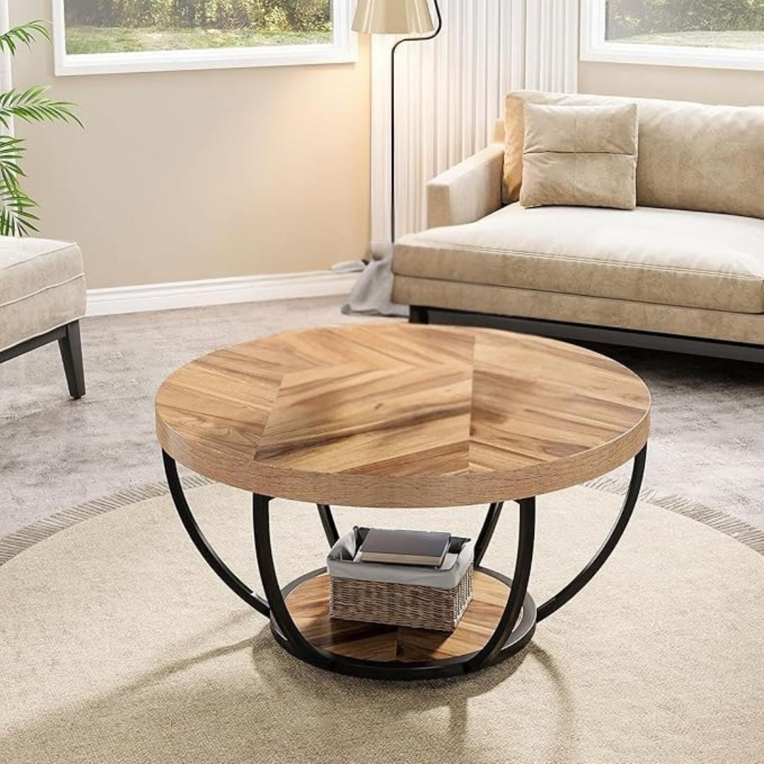 Round wooden rustic coffee table with open black base, set in a modern home.