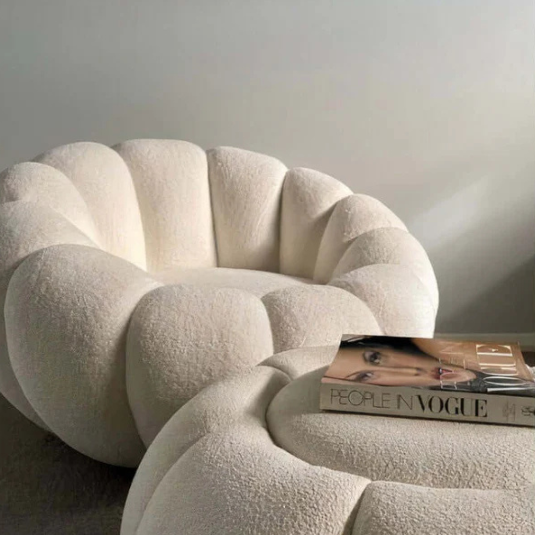 white scalloped pumpkin chair and ottoman