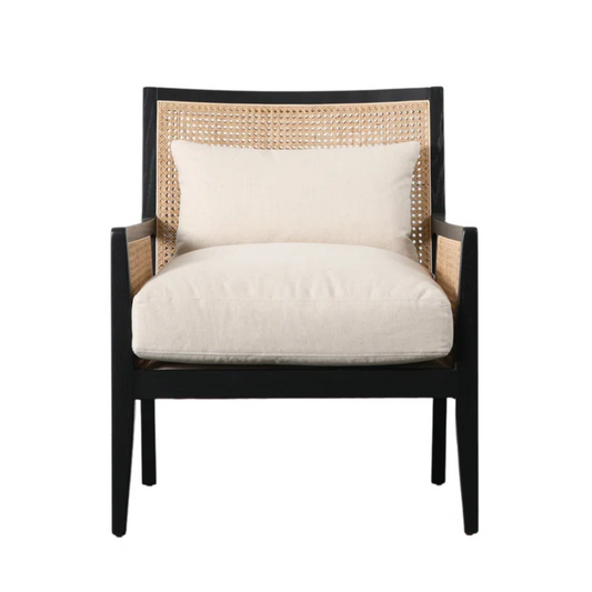 Chair with woven backrest and white cushion on a white background